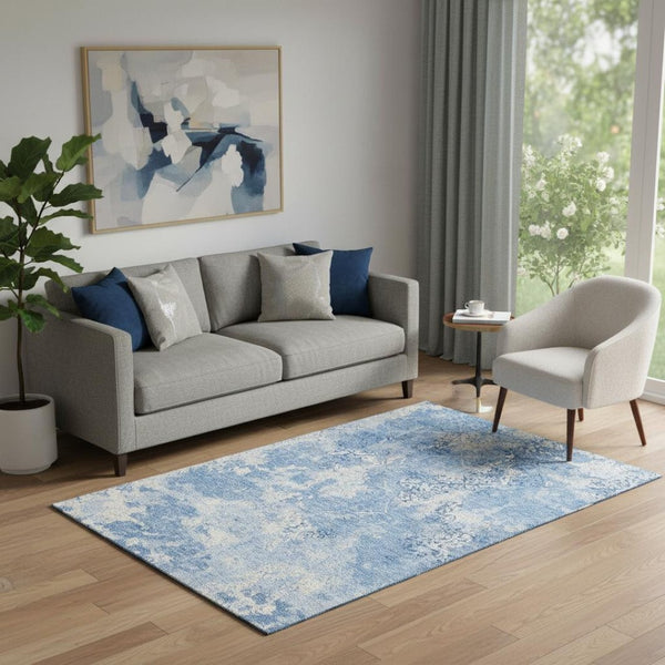HomeRoots 5' X 8' Blue And Ivory Abstract Washable Area Rug - Stylish, Durable, UV-Protected for Every Space 664466