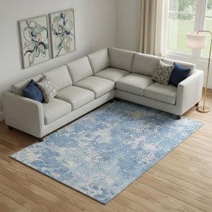 HomeRoots 9' X 12' Blue and Ivory Abstract Area Rug - Durable, Washable, UV-Protected for Modern Living Spaces 664469