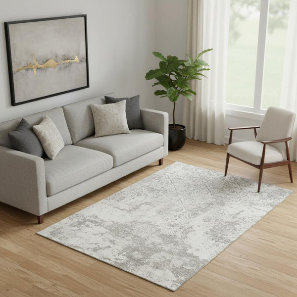 HomeRoots 5' X 8' Ivory and Gray Abstract Area Rug - Washable, UV-Protected, Durable for Busy Homes & Pets 664502