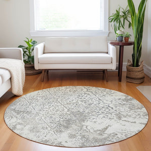 HomeRoots 8' Ivory and Gray Abstract Washable Round Rug - Durable, UV-Protected, Family-Friendly Design for Any Room 664503