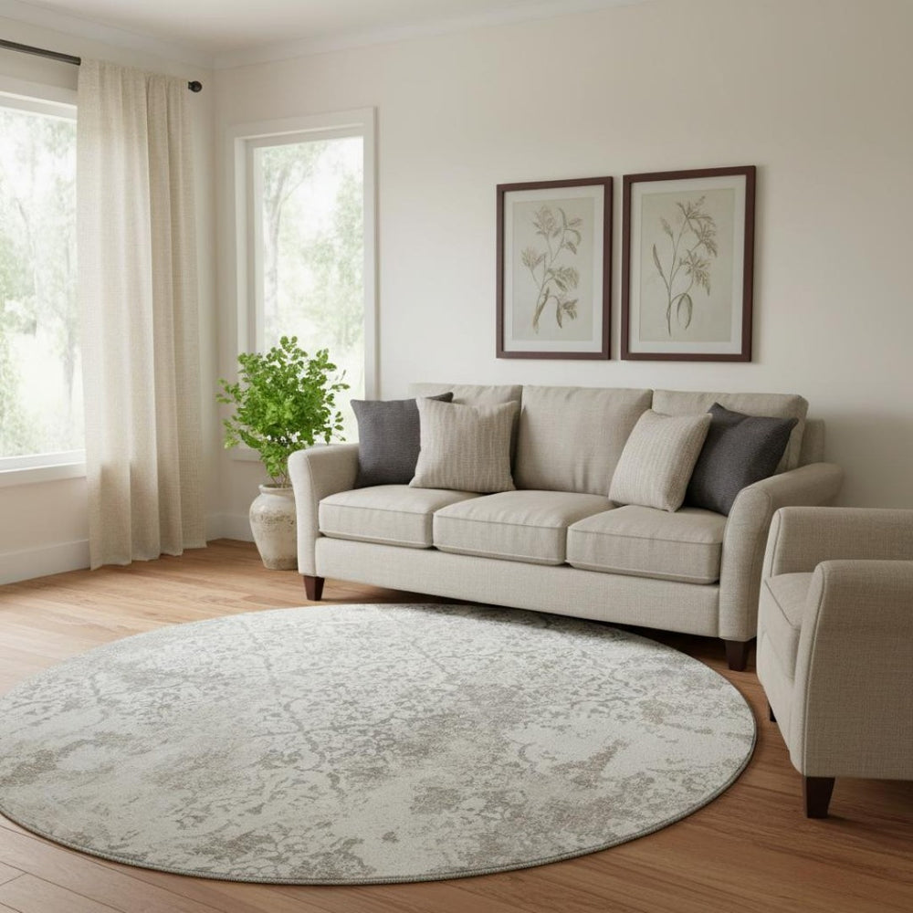 HomeRoots 8' Ivory and Gray Abstract Washable Round Rug - Durable, UV-Protected, Family-Friendly Design for Any Room 664503
