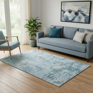 HomeRoots 5' X 8' Abstract Teal Ivory Gray Area Rug - Washable, UV Protected, Durable for Kids & Pets! 664526