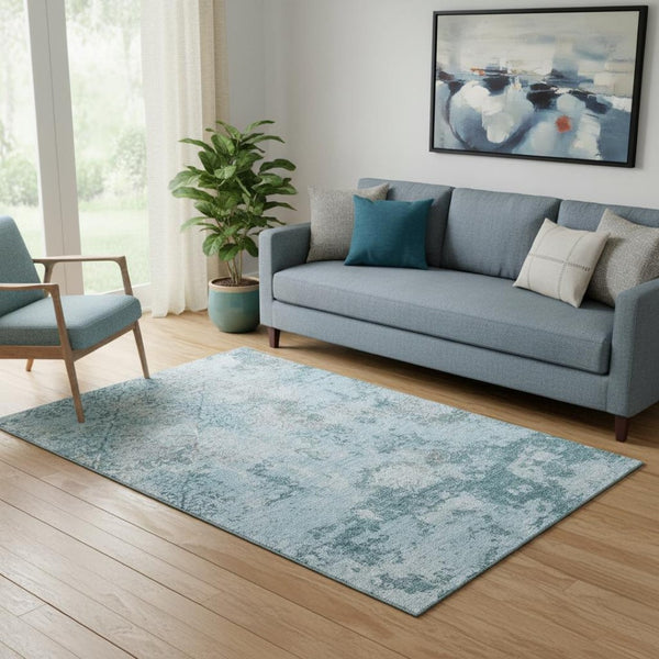 HomeRoots 5' X 8' Abstract Teal Ivory Gray Area Rug - Washable, UV Protected, Durable for Kids & Pets! 664526