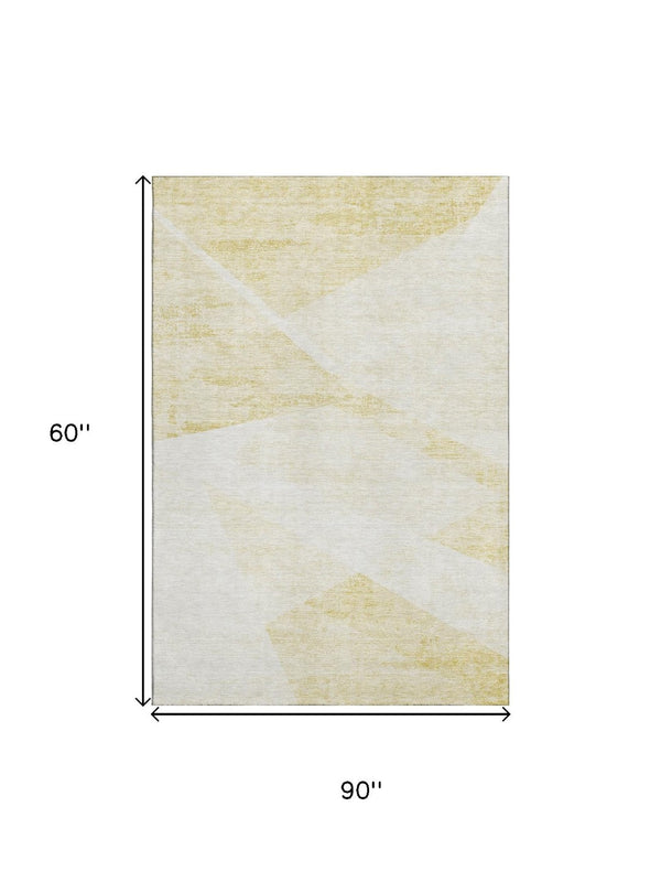 HomeRoots 5' X 8' Gold and Ivory Geometric Area Rug – Washable, Stain-Resistant with UV Protection for Modern Spaces 664566