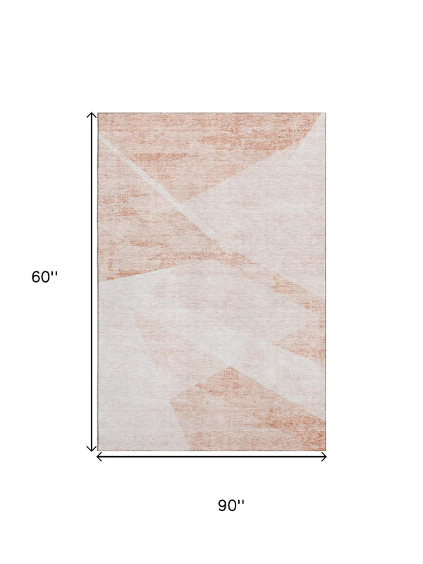 HomeRoots 5' X 8' Salmon and Ivory Geometric Area Rug – Washable, UV-Protected, Durable for Homes with Kids & Pets 664584