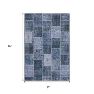 HomeRoots 5' X 8' Stylish Blue and Gray Patchwork Area Rug with Stain Resistance and UV Protection for Homes 664650