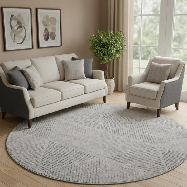 HomeRoots 8' Taupe and Ivory Geometric Washable Round Rug with UV Protection for Stylish, Easy Care Living Spaces 664879