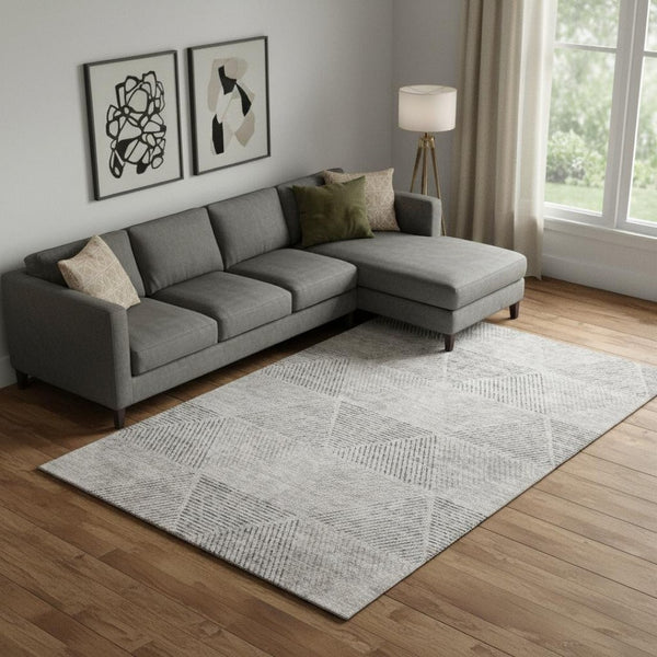 HomeRoots 10' X 14' Taupe and Ivory Geometric Area Rug - Washable, UV-Protected, Durable for High-Traffic Spaces 664882