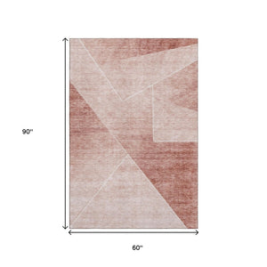 HomeRoots 5' X 8' Salmon and Ivory Geometric Area Rug – Washable, UV-Protected, Perfect for High-Traffic Spaces 664968