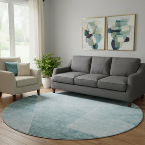 HomeRoots 8' Teal and Ivory Geometric Round Rug – Washable, UV-Resistant, Durable, and Stylish for Any Space 664975