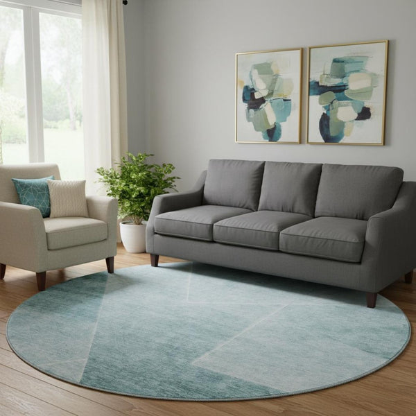 HomeRoots 8' Teal and Ivory Geometric Round Rug – Washable, UV-Resistant, Durable, and Stylish for Any Space 664975