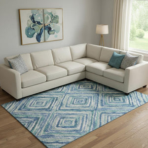 HomeRoots 9' X 12' Modern Geometric Area Rug in Blue, Green & Ivory - Washable, Stain Resistant, UV Protected 664983