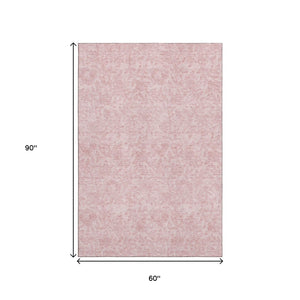HomeRoots 5' X 8' Pink and Ivory Floral Area Rug - Washable, UV Protected, Durable for High-Traffic Spaces 665058