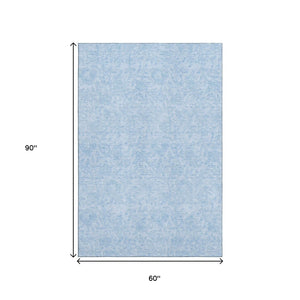 HomeRoots 5' X 8' Sky Blue Floral Area Rug - Washable, Stain-Resistant with UV Protection for High-Traffic Areas 665064