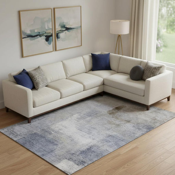 HomeRoots 8' X 10' Soft Blue Ivory Beige Abstract Washable Area Rug with UV Protection for Stylish Spaces 665258