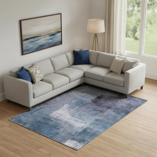HomeRoots 9' X 12' Navy Blue and Ivory Abstract Area Rug - Washable, UV Protected, Durable & Stylish Design 665283