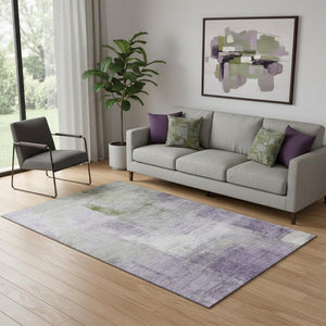 HomeRoots 5' X 8' Washable Abstract Area Rug in Purple, Ivory & Green - UV Protected, Perfect for Homes with Kids! 665286