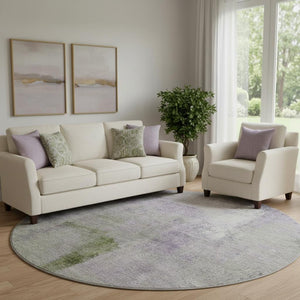 HomeRoots 8' Modern Abstract Round Rug in Purple, Ivory & Green - Washable, UV Protected & Stain Resistant! 665287