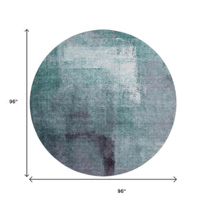 HomeRoots 8' Teal Ivory & Purple Abstract Washable Round Rug - Durable, UV Protected for High-Traffic Areas 665299