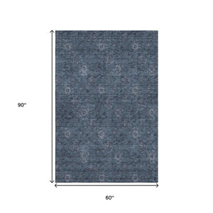 HomeRoots 5' X 8' Blue and Ivory Floral Area Rug - Washable, UV-Protected, Durable Design for Homes with Pets 665304