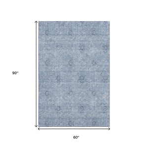 HomeRoots 5' X 8' Sky Blue & Ivory Floral Area Rug - Stain Resistant, UV Protected, Machine Washable, Durable Charm 665364