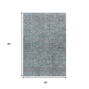 HomeRoots 5' X 8' Teal and Gray Southwestern Area Rug – Durable, Washable, UV Protected for Kid & Pet-Friendly Homes 665447