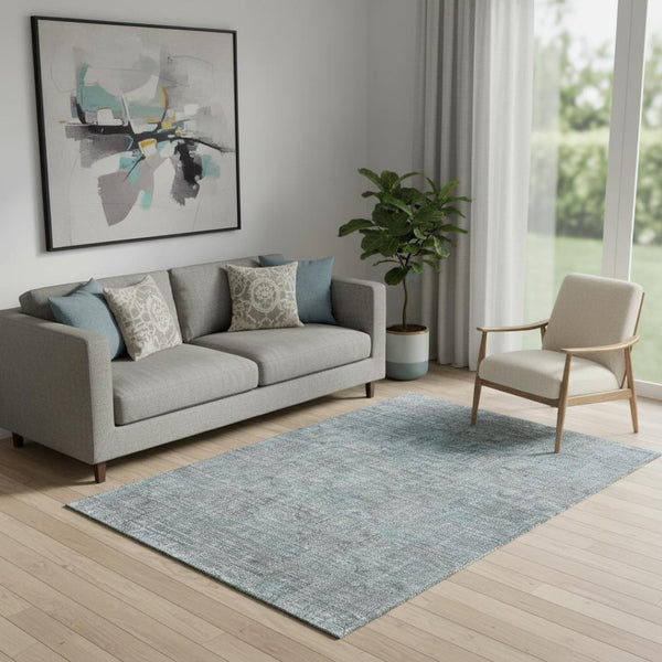 HomeRoots 5' X 8' Teal and Gray Southwestern Area Rug – Durable, Washable, UV Protected for Kid & Pet-Friendly Homes 665447