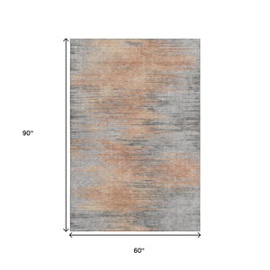 HomeRoots 5' X 8' Salmon And Gray Abstract Area Rug - Stylish, Washable, UV Protected for Modern Homes 665533