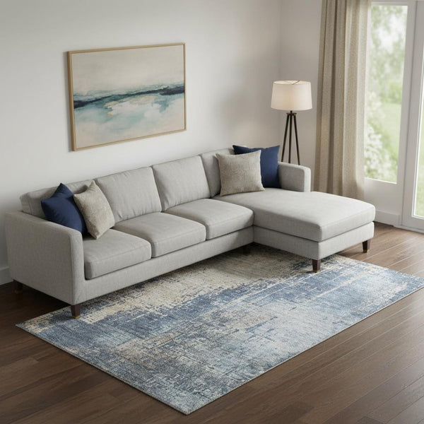 HomeRoots 9' X 12' Abstract Washable Area Rug in Navy Blue, Beige & Taupe with UV Protection for Homes 665602