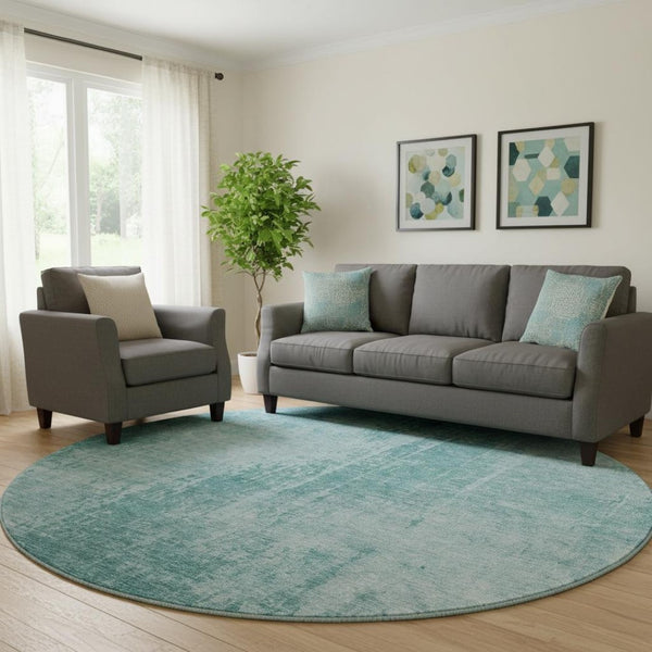 HomeRoots 8' Aqua and Teal Abstract Washable Round Rug - Durable, UV Protected, Stylish for High-Traffic Areas 665612