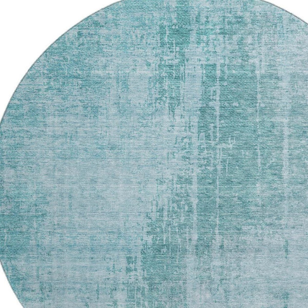 HomeRoots 8' Aqua and Teal Abstract Washable Round Rug - Durable, UV Protected, Stylish for High-Traffic Areas 665612