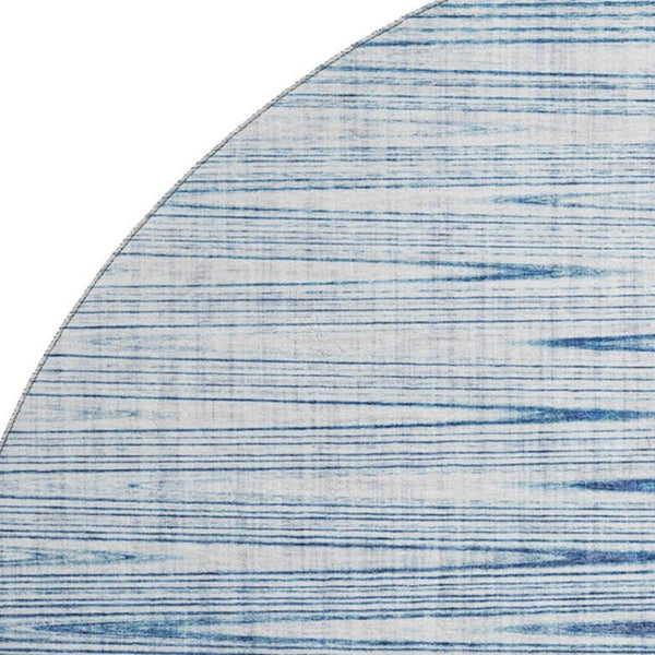 HomeRoots 8' Stylish Blue and Ivory Abstract Washable Round Rug with UV Protection for High-Traffic Areas 665756