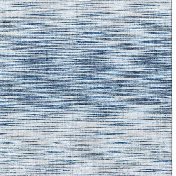HomeRoots 10' X 14' Blue and Ivory Abstract Area Rug - Stylish, Washable, UV-Protected, Perfect for High-Traffic Areas 665759