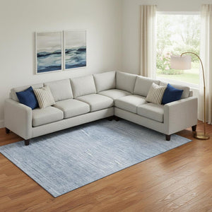 HomeRoots 9' X 12' Denim Blue & Ivory Abstract Area Rug - Stylish, Washable, UV Protected, Perfect for Families! 665764