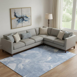 HomeRoots 8' X 10' Blue and Ivory Abstract Area Rug - Washable, UV Protected, Durable, and Stylish Design! 665823