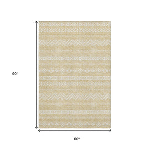 HomeRoots 5' X 8' Southwestern Washable Area Rug – Gold & Beige Geometric Design with UV Protection & Durability 665887