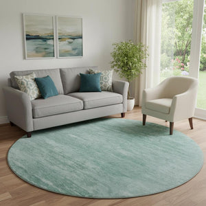 HomeRoots 8' Aqua and Teal Abstract Round Rug - Washable, UV-Protected, Stain-Resistant for High-Traffic Areas 665984