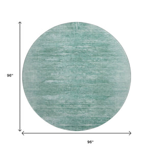 HomeRoots 8' Aqua and Teal Abstract Round Rug - Washable, UV-Protected, Stain-Resistant for High-Traffic Areas 665984