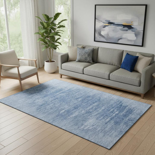 HomeRoots 5' X 8' Stylish Blue and Ivory Abstract Washable Area Rug with UV Protection for Modern Living Spaces 665989