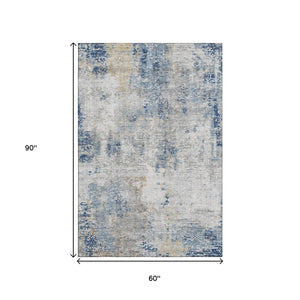 HomeRoots 5' X 8' Abstract Washable Area Rug in Blue Taupe Ivory - UV Protection, Stain Resistant, Durable Design 666223