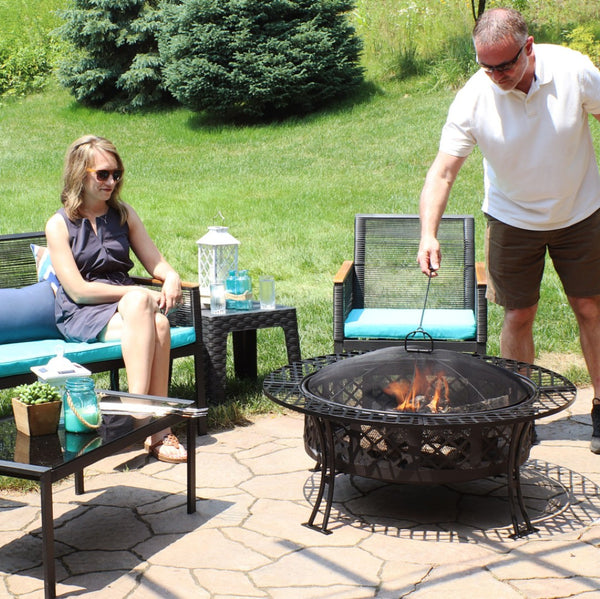 HomeRoots 40" Black Steel Wood Burning Fire Pit - Create Cozy Outdoor Gatherings with Spark Screen & Poker 666302
