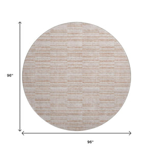 HomeRoots 8' Salmon and Beige Striped Round Rug – Washable, UV Protected, Durable, Ideal for Homes with Kids & Pets 666341