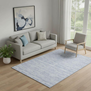 HomeRoots 5' X 8' Sky Blue and Ivory Striped Area Rug - Durable, Washable Design with UV Protection & Charm 666346