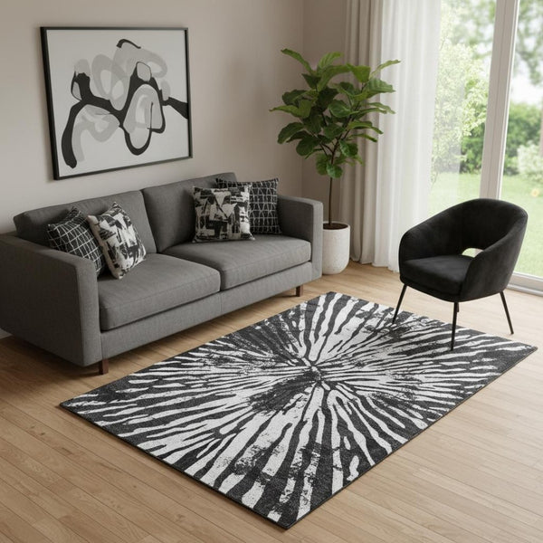 HomeRoots 5' X 8' Stylish Black and Ivory Zebra Print Washable Rug with UV Protection for Easy Care & Durability 666370