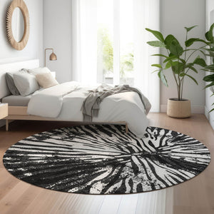 HomeRoots 8' Stylish Black and Ivory Zebra Print Washable Round Rug with UV Protection for Family Spaces 666371