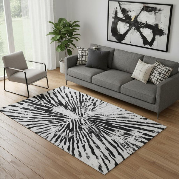 HomeRoots 5' X 8' Washable Ivory and Black Zebra Print Area Rug with UV Protection for Stylish Everyday Living 666388