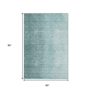 HomeRoots 5' X 8' Teal Ombre Area Rug - Modern, Washable, Stain-Resistant with UV Protection for Every Space 666610