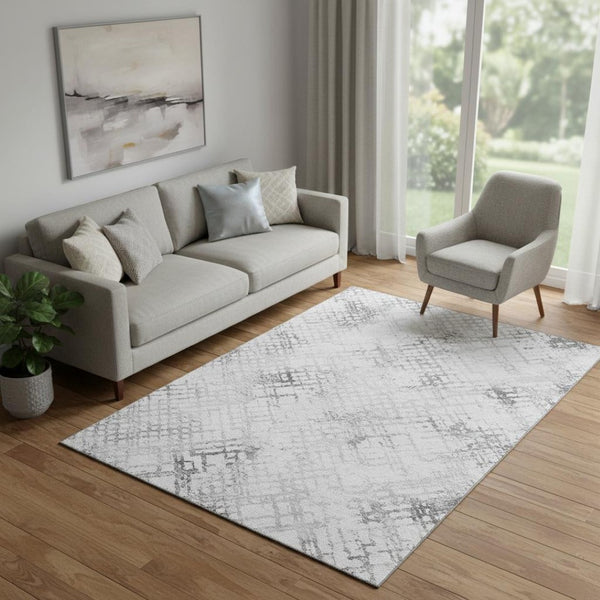 HomeRoots 5' X 8' Gray And Silver Abstract Geometric Area Rug - Washable, UV-Protected, Modern Elegance! 666640