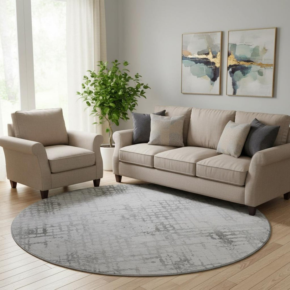 HomeRoots 8' Gray and Silver Geometric Round Rug - Washable, UV Protected, Stain Resistant for Modern Spaces 666641