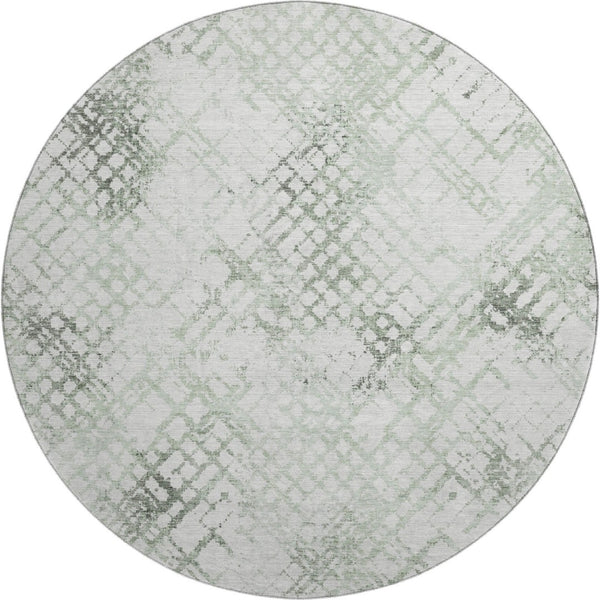 HomeRoots 8' Green and Ivory Abstract Geometric Round Rug - Washable, UV-Protected, and Perfect for Any Space 666647